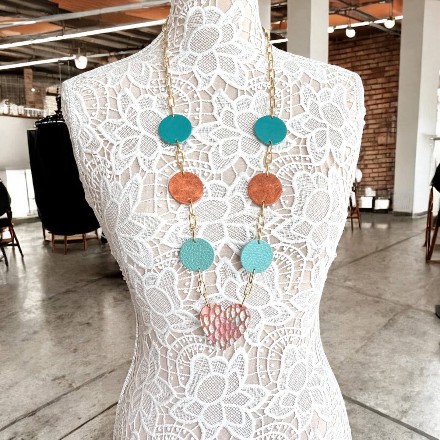 EMBOSSED LEATHER HEART NECKLACE