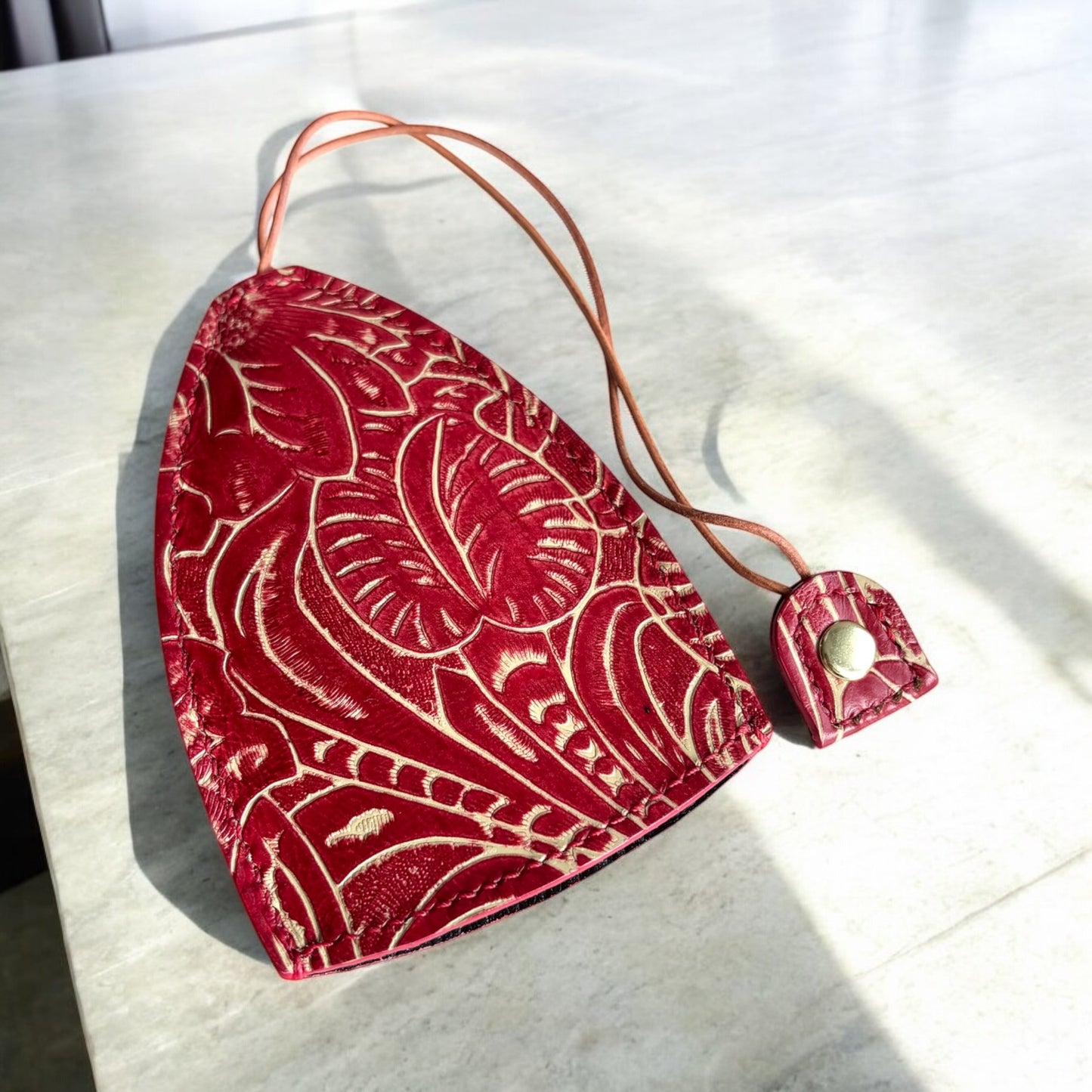 EMBOSSED LEATHER TOTE BAG