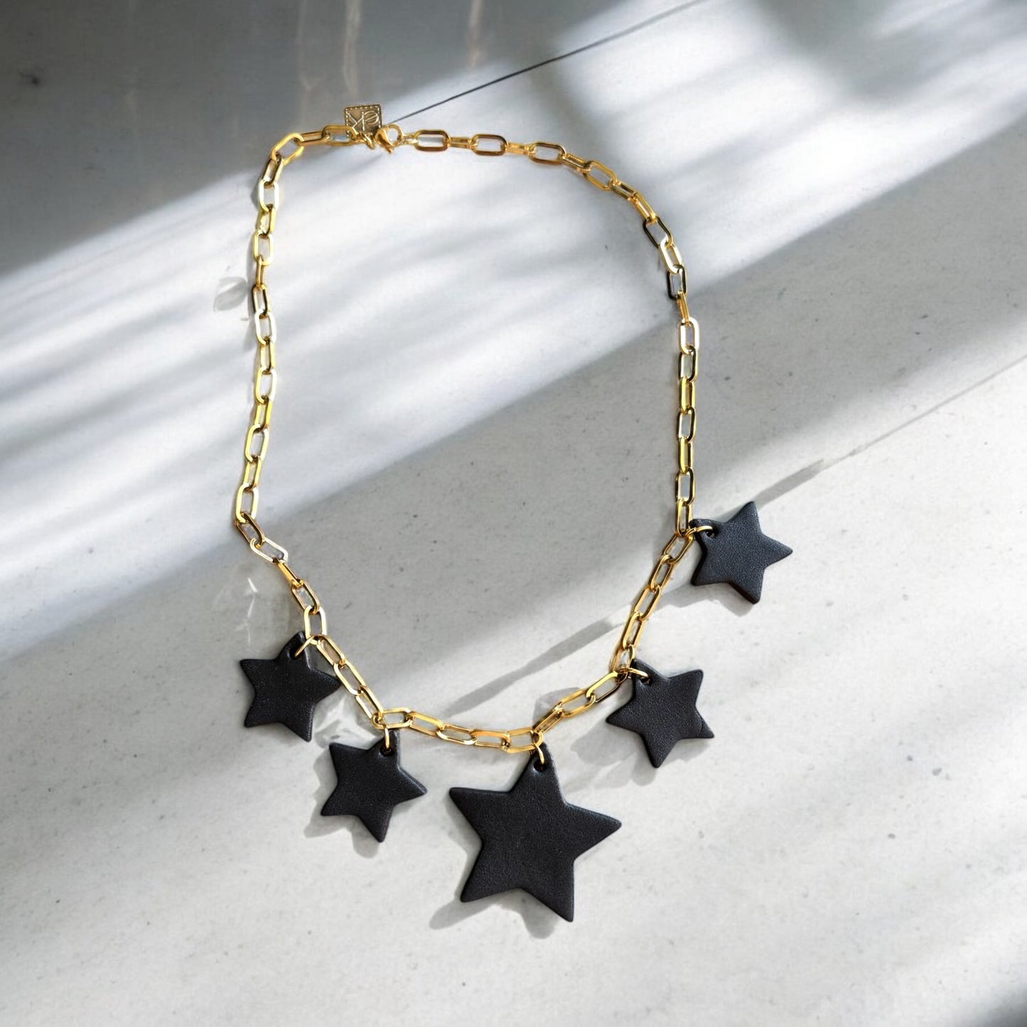 LEATHER STARS NECKLACE