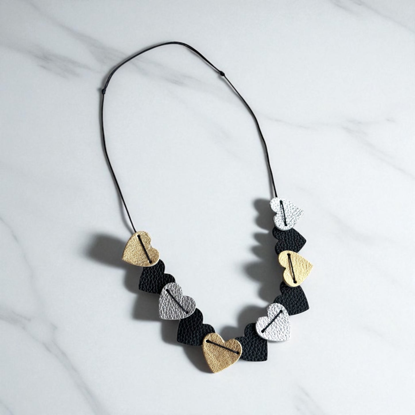 LEATHER HEARTS NECKLACE