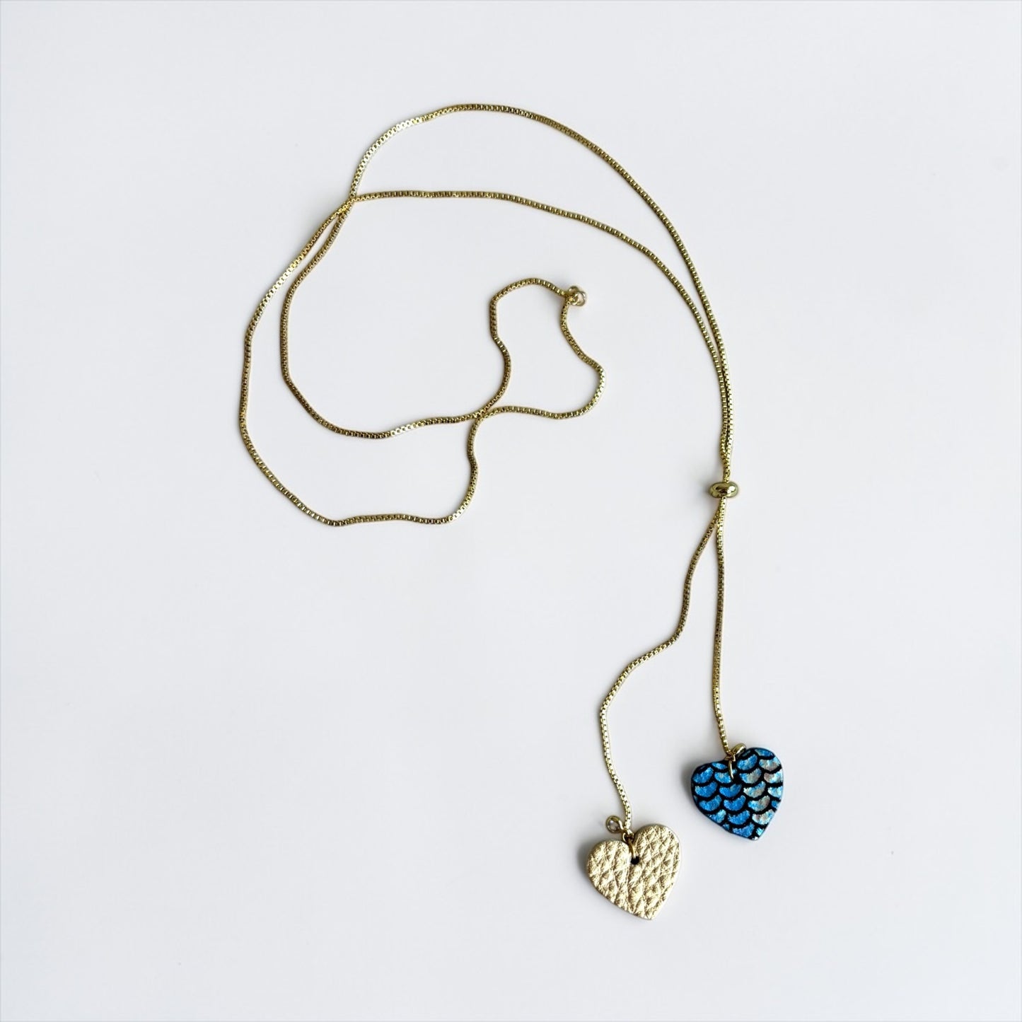 SLIDER LEATHER HEARTS NECKLACE