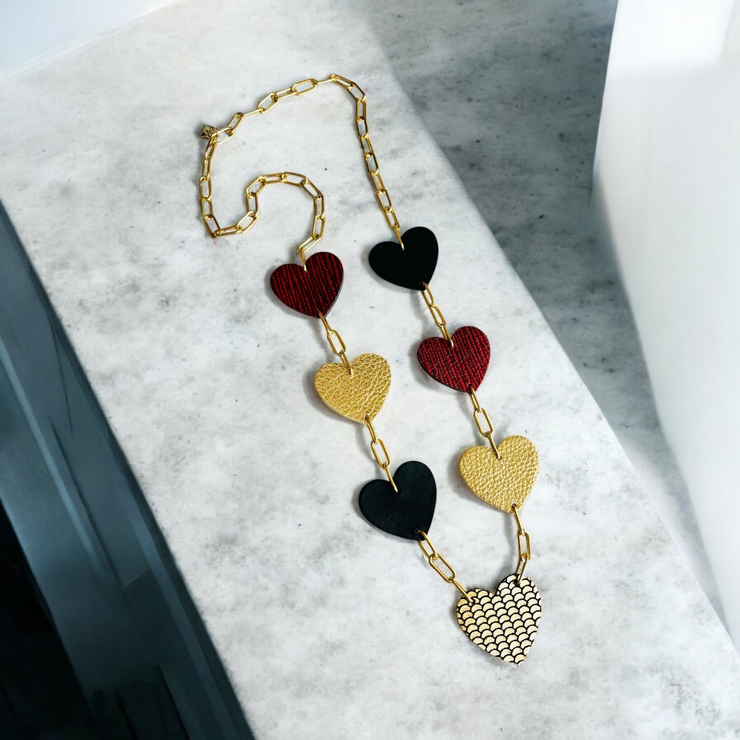 LEATHER HEARTS NECKLACE