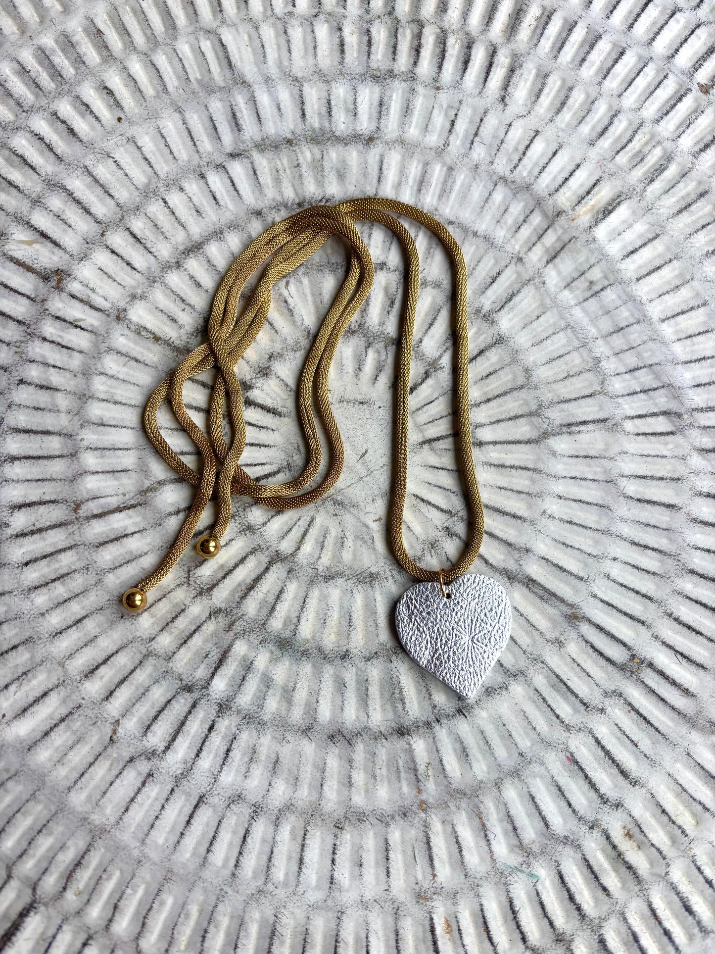 LEATHER HEART NECKLACE
