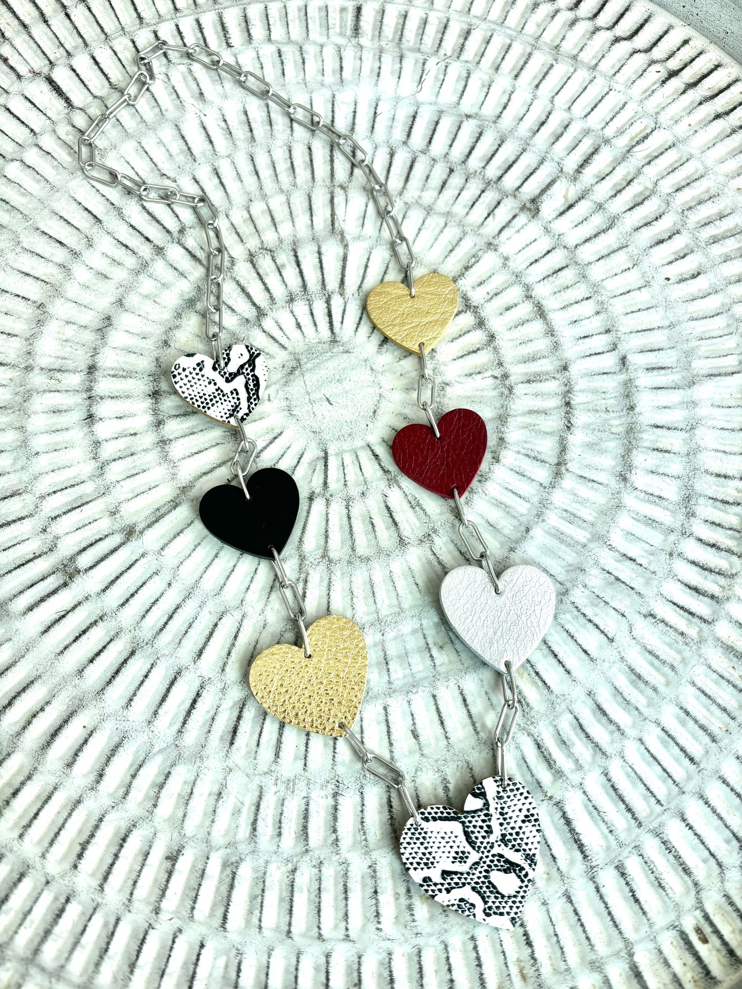 LEATHER HEARTS NECKLACE