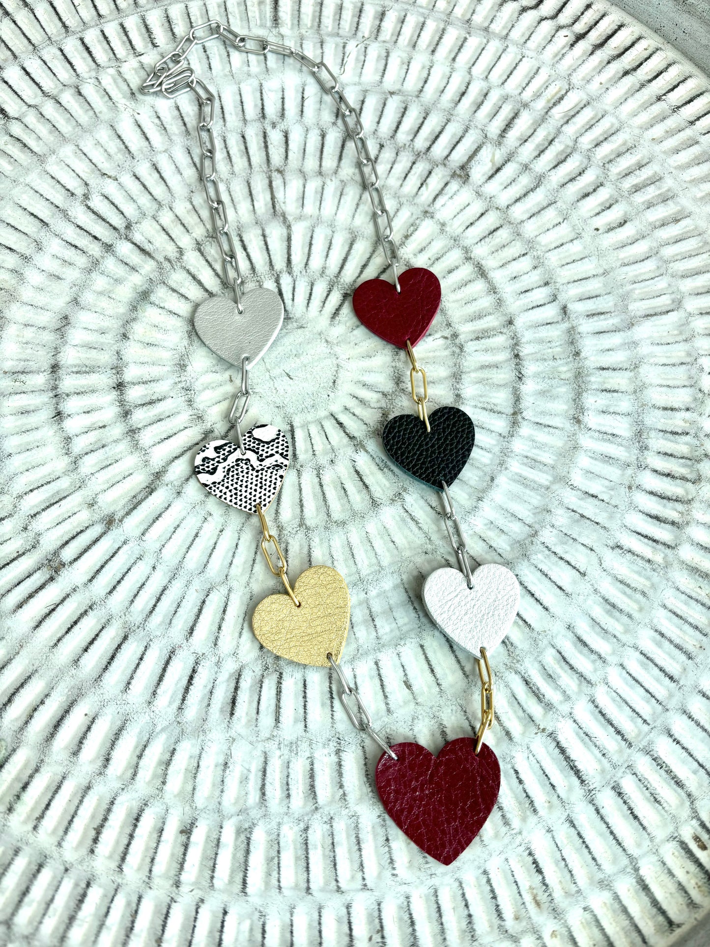 LEATHER HEARTS NECKLACE